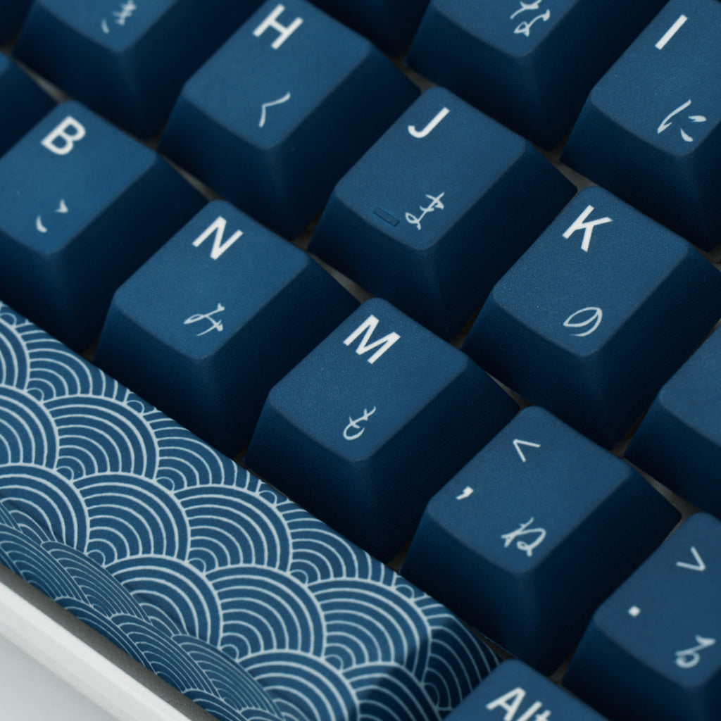 Indigo Samurai keycaps with rich blue hues and intricate Japanese-inspired design elements. Middle close up view.