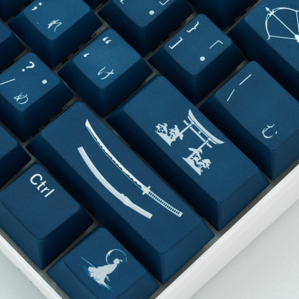 Indigo Samurai keycaps with rich blue hues and intricate Japanese-inspired design elements. Right side close up view.