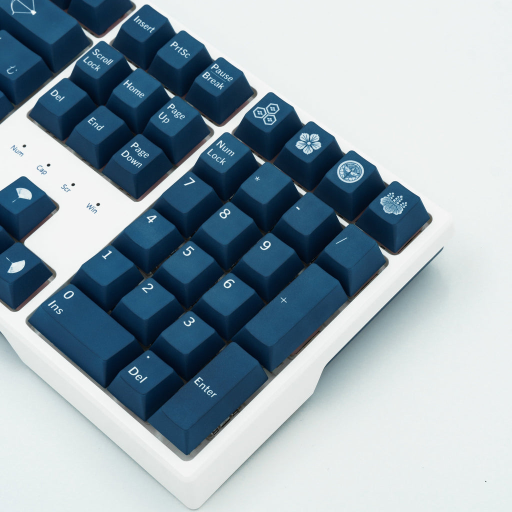 Indigo Samurai keycaps with rich blue hues and intricate Japanese-inspired design elements. Ride side close up view.