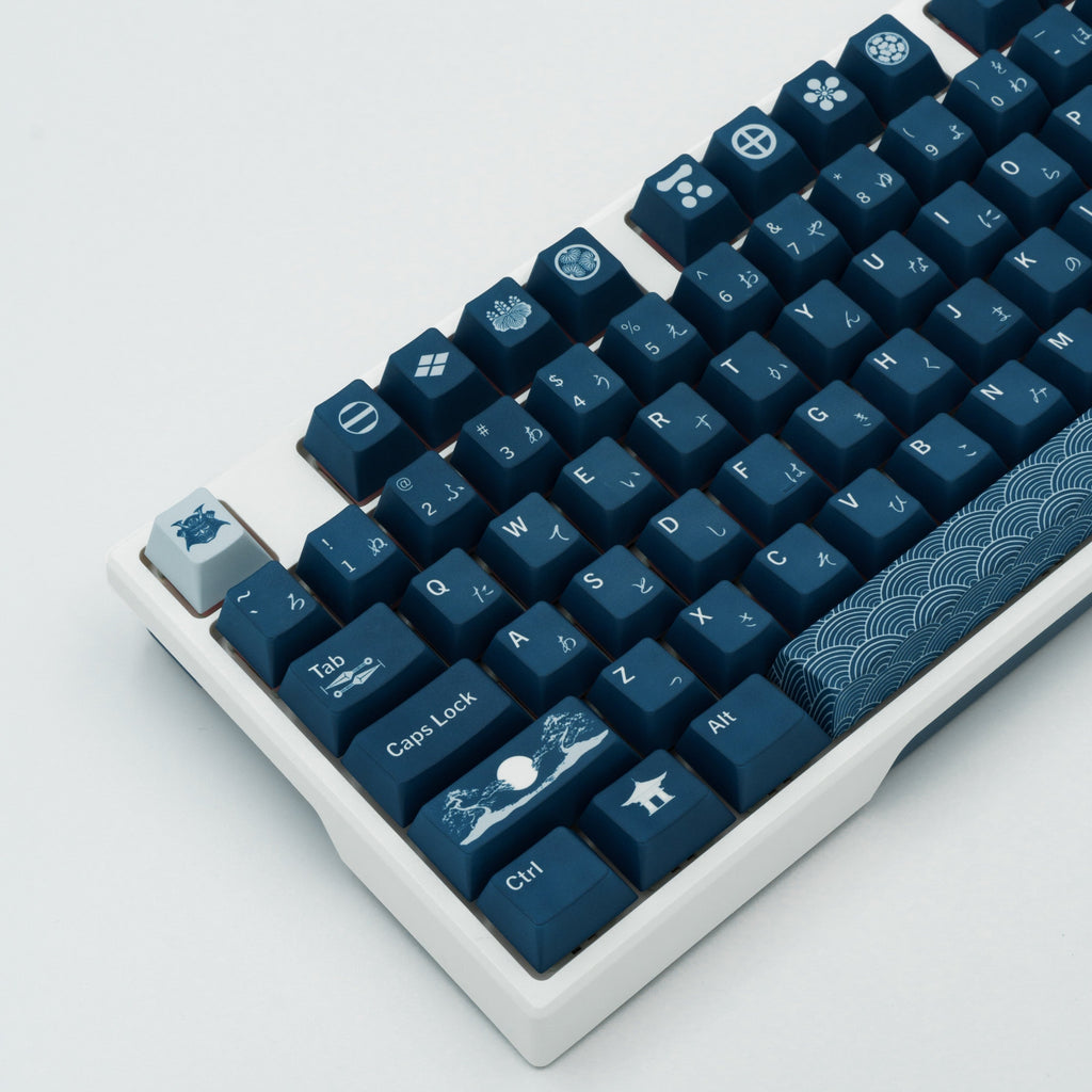 Indigo Samurai keycaps with rich blue hues and intricate Japanese-inspired design elements. Left side view.