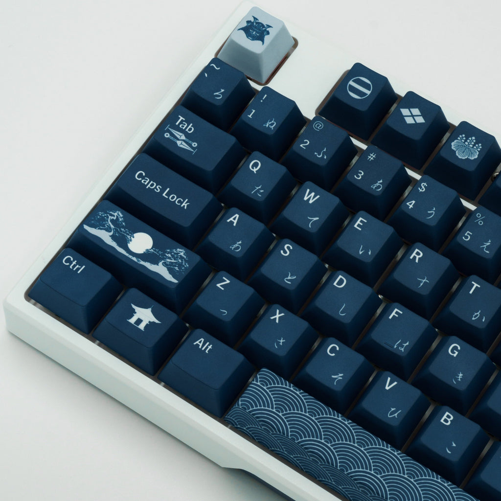 Indigo Samurai keycaps with rich blue hues and intricate Japanese-inspired design elements. Left side angle view.