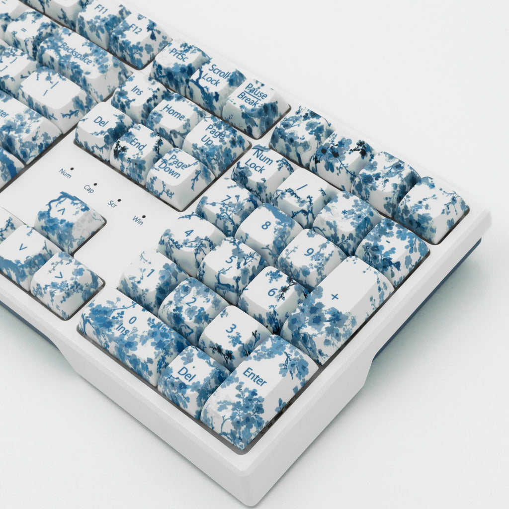 Blue Porcelain Flower Keycaps, inspired by blue and white Chinese Porcelain. Close up right side view. 