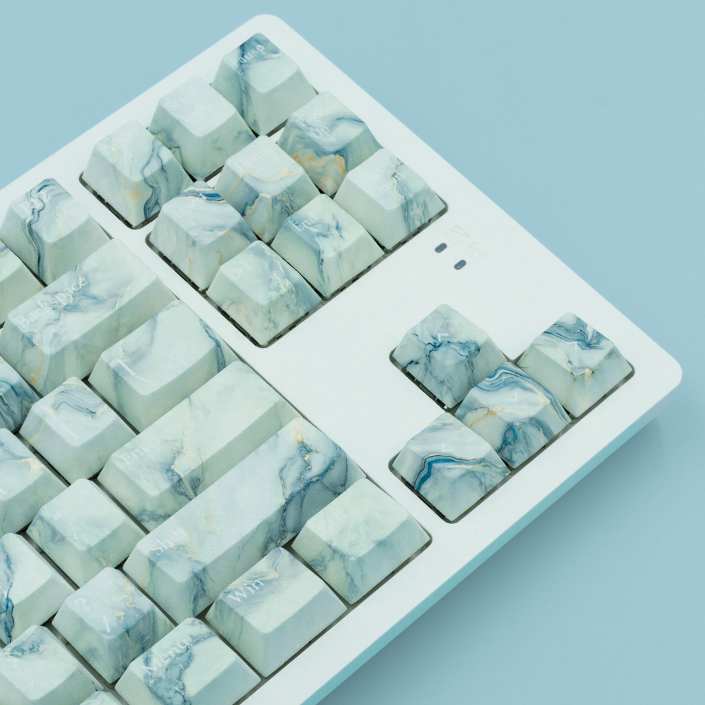 Arctic Marble Keycaps, featuring blue and white color scheme. Inspired by the Arctic landscape and Marble stone.  Right Side close up view. 